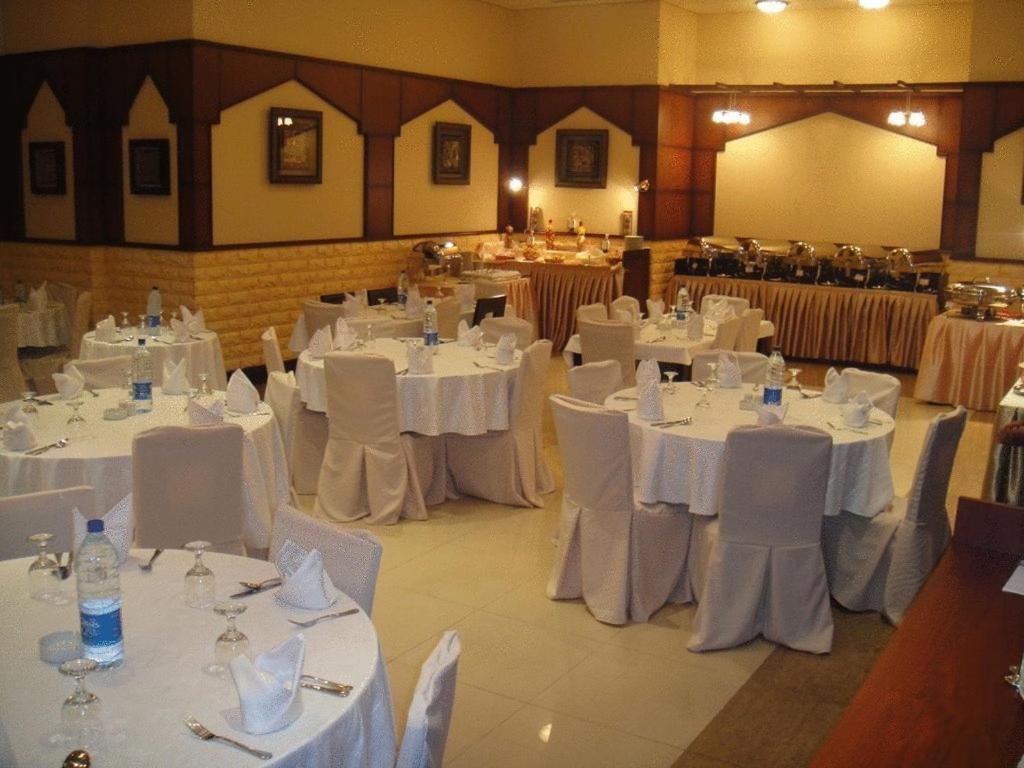 L'Arabia Hotel Apartments Abu Dabi Restoran fotoğraf